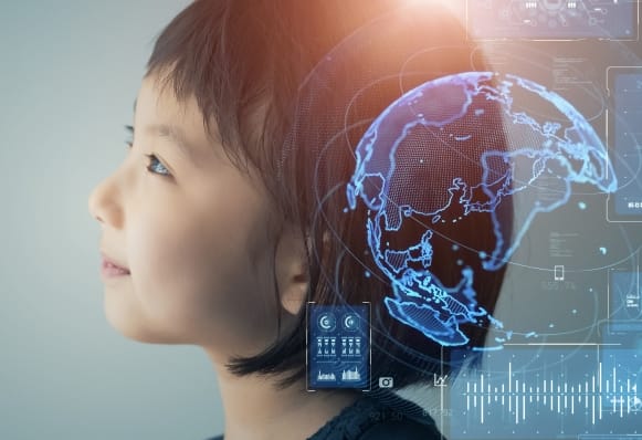 テクノロジーと未来を象徴する子どもと地球のビジュアル